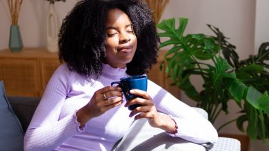 Woman drinks tea for anxiety.