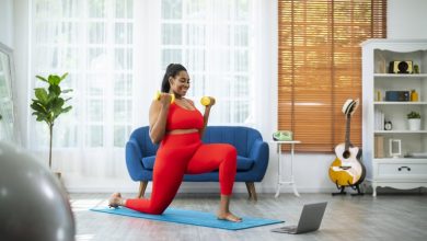 woman doing a workout online on laptop as part of 75 soft challenge