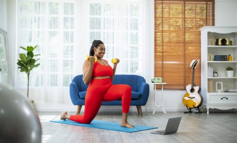 woman doing a workout online on laptop as part of 75 soft challenge