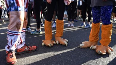 Runners wear turkey costumes at Turkey Trot in Denver, Colorado