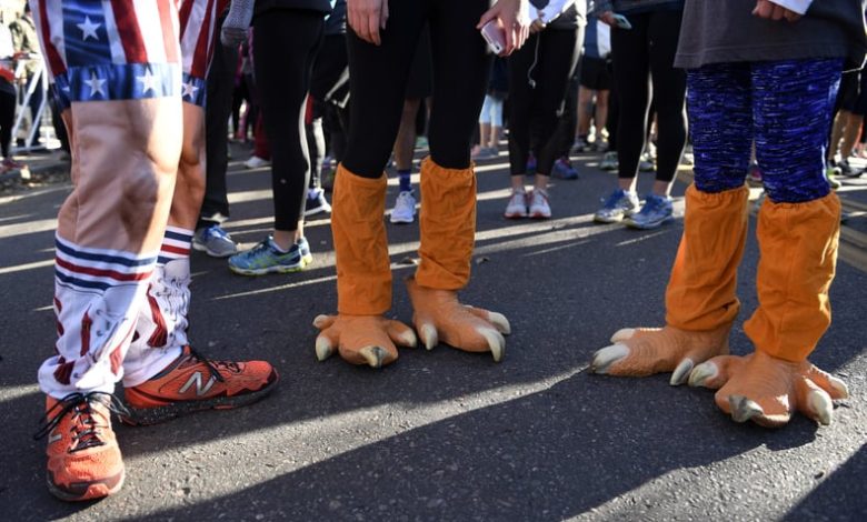 Runners wear turkey costumes at Turkey Trot in Denver, Colorado