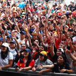 AUSTIN, TEXAS - OCTOBER 18: Fans enjoy the atmosphere at the fan stage prior to practice ahead of the F1 Grand Prix of United States at Circuit of The Americas on October 18, 2024 in Austin, Texas. (Photo by Peter Fox - Formula 1/Formula 1 via Getty Image