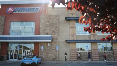 People outside the 24 Hour Fitness/Redwood City Super Sport in Redwood City, Calif