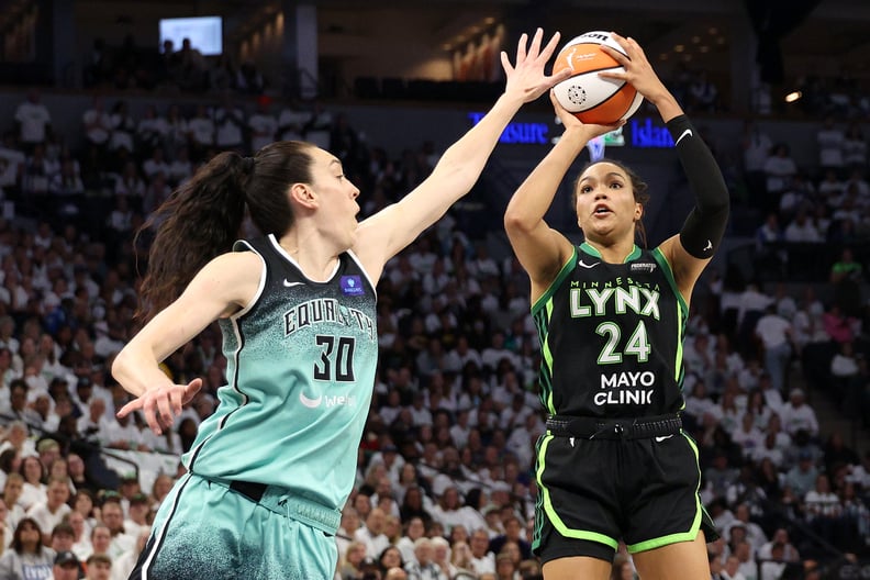 Napheesa Collier #24 of the Minnesota Lynx shoots the ball against Breanna Stewart #30 of the New York Liberty.